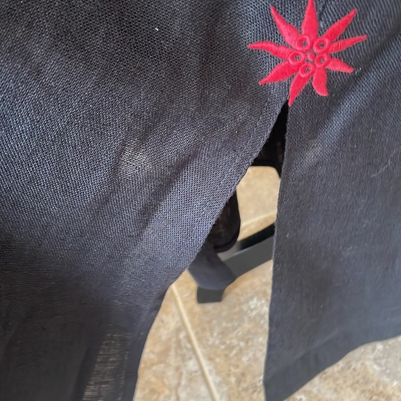 Switzerland Linen Black Edelweiss embroidered long skirt with slits at bottom. - Picture 4 of 7